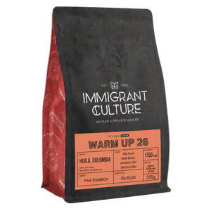 Coffee bag from Immigrant Culture on a gray background