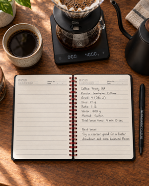 Coffee Notes Set opened to lined pages with handwritten Fruity IPA brew notes at a coffee bar