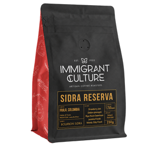 Sidra Reserva 250g coffee bag, black and gold label, El Diviso Lasso Brothers